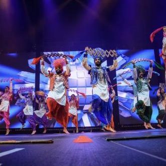 Bhangra dancers on stage