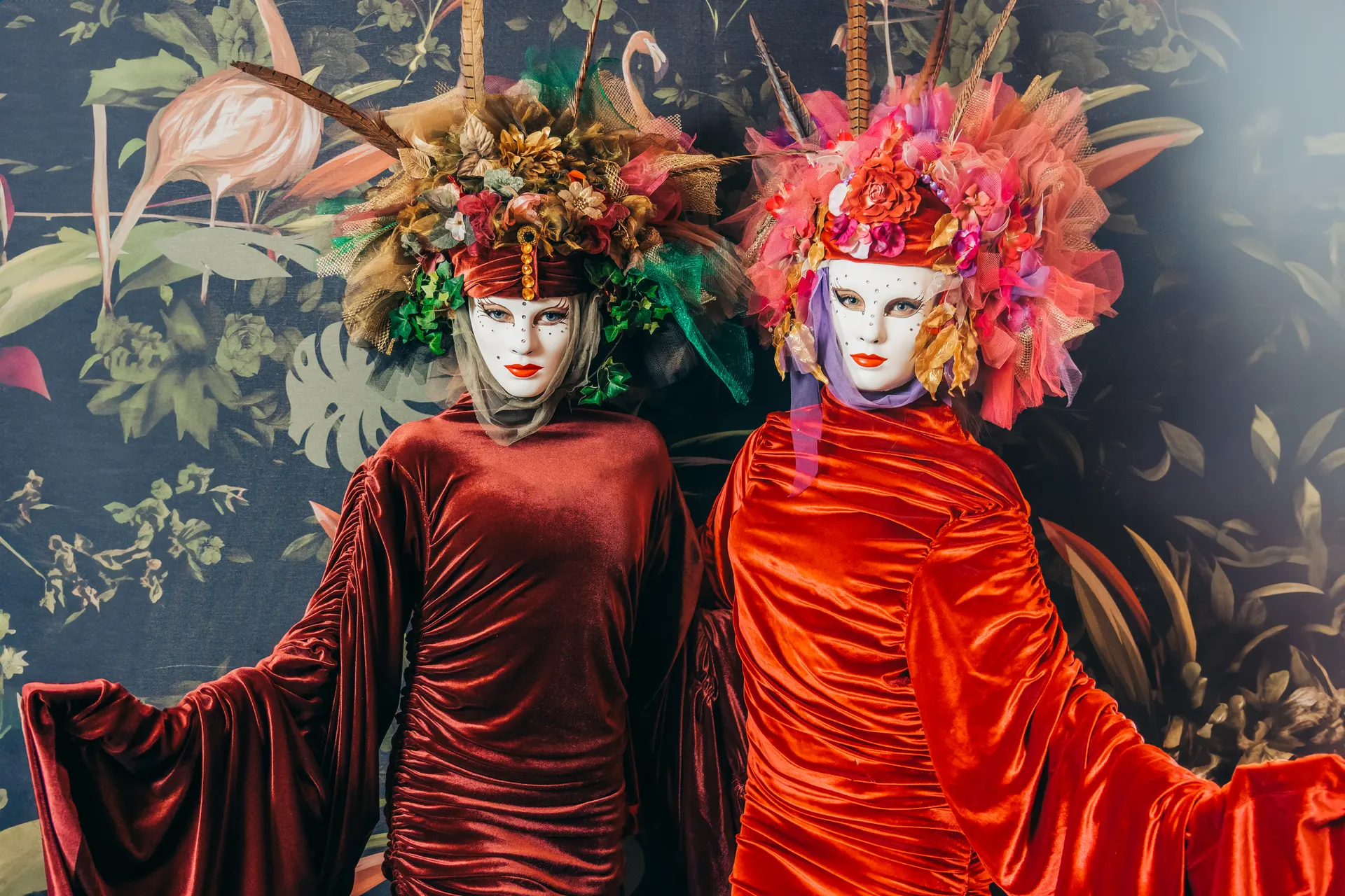 Masked living statues in floral costumes